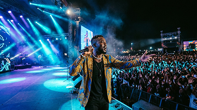 African artist performing on stage
